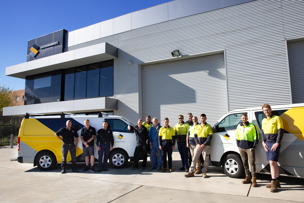 The Screenmakers team gather outside their premises in Queanbeyan, near Canberra.